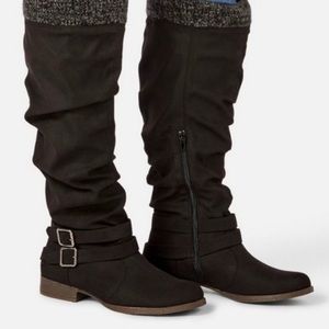 Black suede boots with sweater cuff